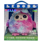 Multicolored plush toy with a blue handle in front of its packaging, featuring brand logos.